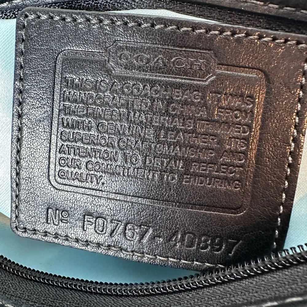 Coach Black Signature Crossbody Bag with brass hardware